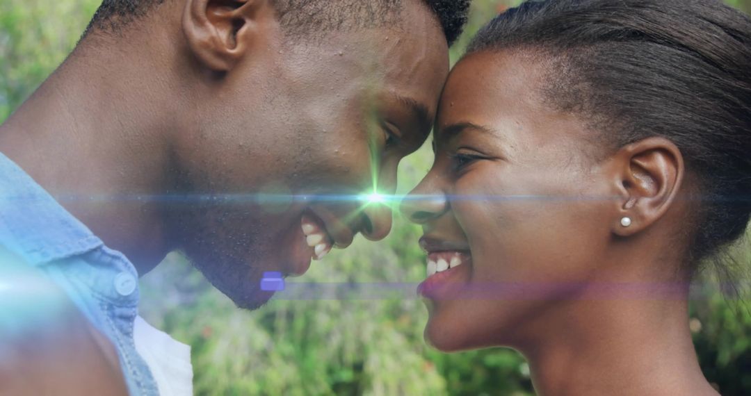 Affectionate Couple Connecting Foreheads in Light