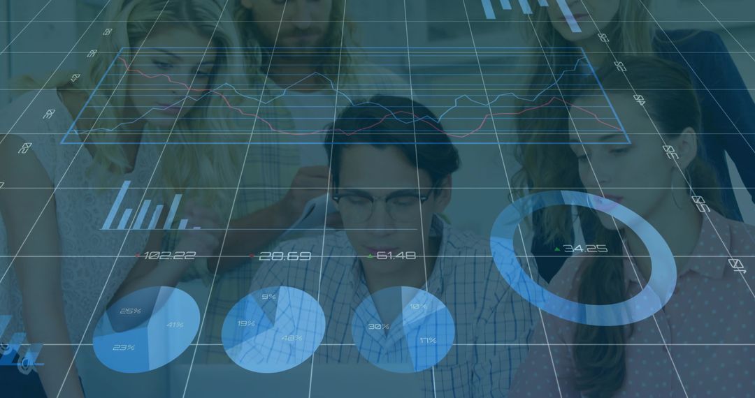 Young Professionals Using Digital Analytics at Business Meeting