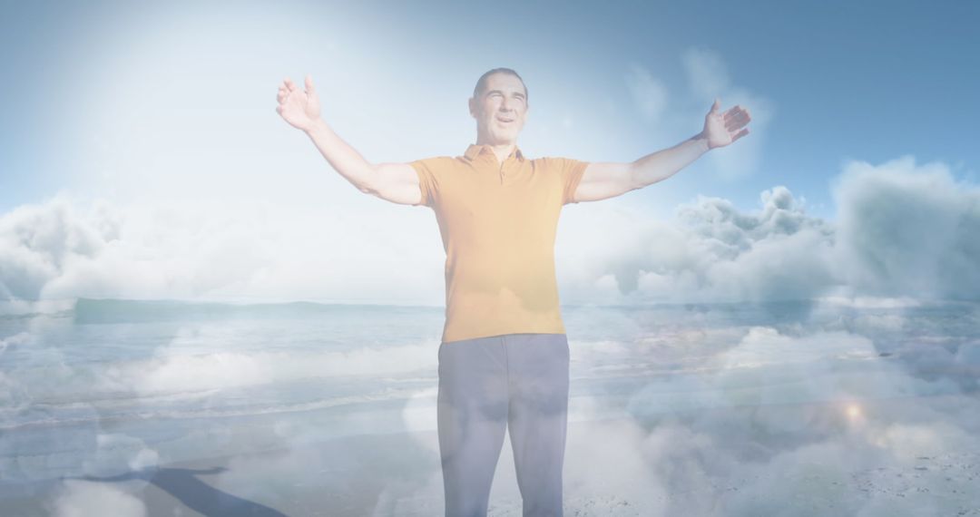 Joyful Elderly Man with Outstretched Arms by Seaside