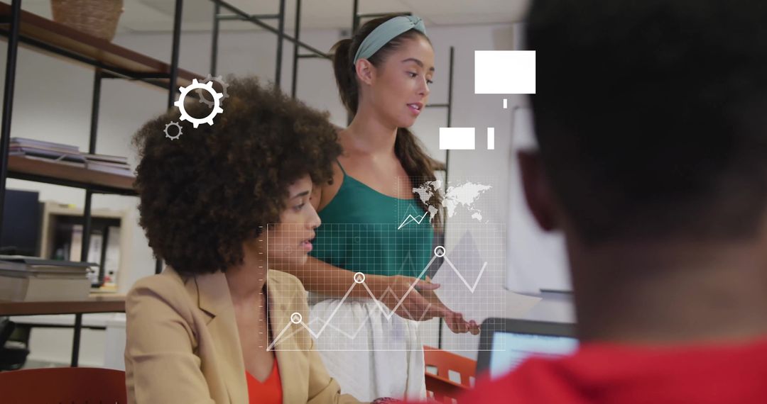 Diverse Colleagues Discussing Data in Creative Office