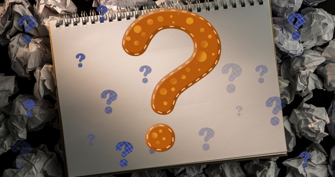 Colorful Question Marks Over Notebook with Crumpled Paper Background