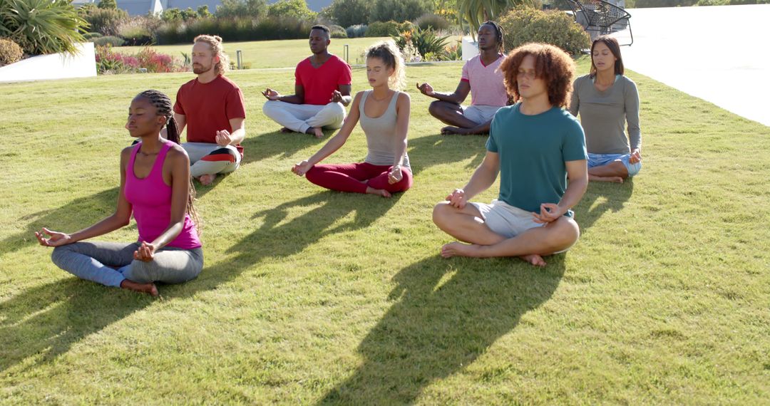 Diverse Group Meditating Outdoors in Yoga Pose, Focused on Mindfulness - Free Images, Stock Photos and Pictures on Pikwizard.com