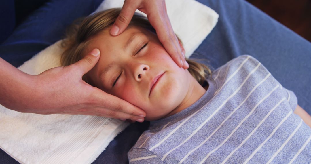 Child Receiving Gentle Facial Massage from Therapist at Spa - Free Images, Stock Photos and Pictures on Pikwizard.com