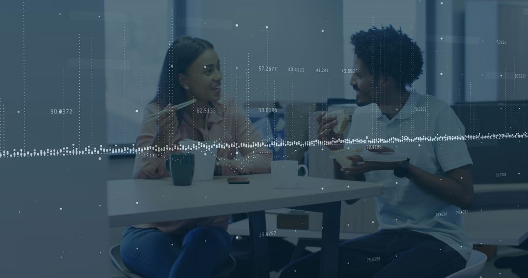 Diverse Coworkers Discussing Business Reports Over Lunch