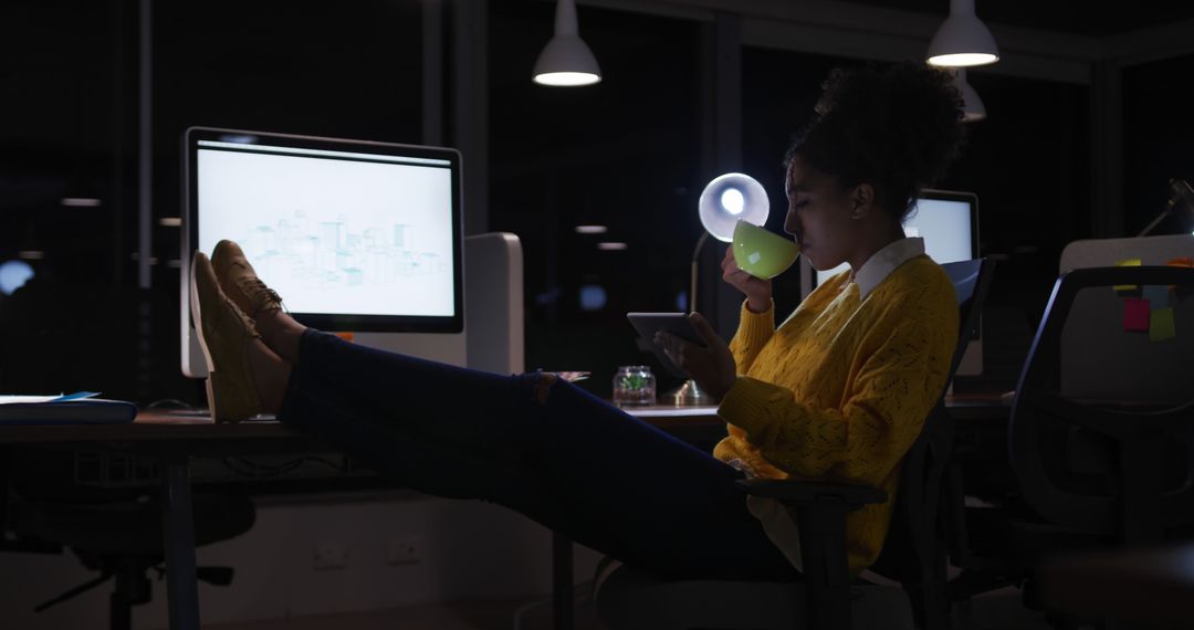 Young Woman Working Late at Night in Modern Office - Free Images, Stock Photos and Pictures on Pikwizard.com