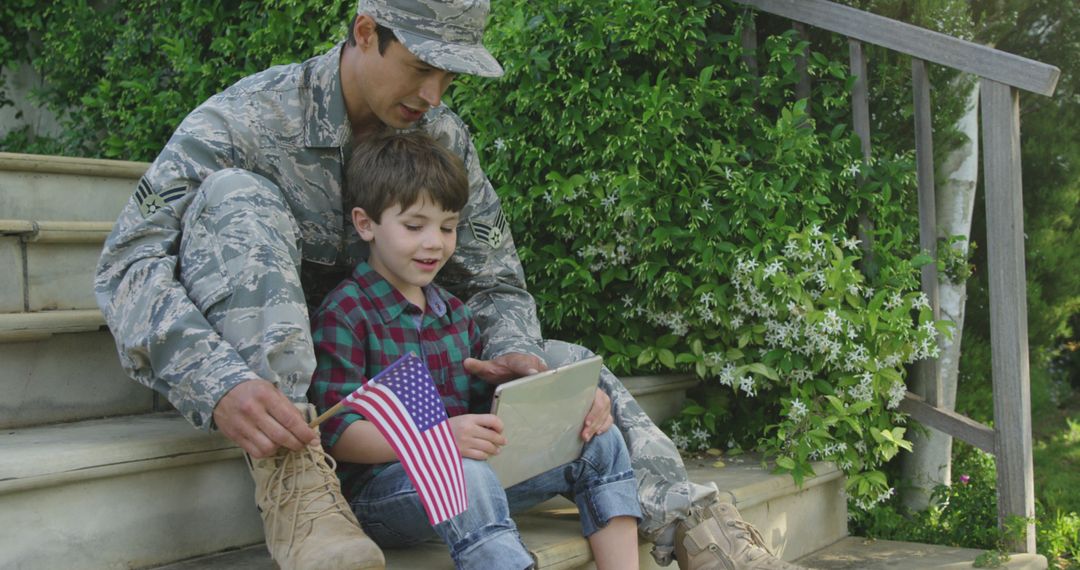 Military Father Spending Quality Time with Son on Easter Holidays Outdoors - Free Images, Stock Photos and Pictures on Pikwizard.com