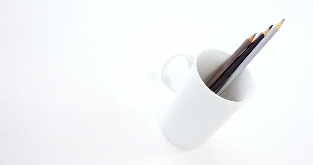 Minimalist Mug with Pencils on White Background - Free Images, Stock Photos and Pictures on Pikwizard.com