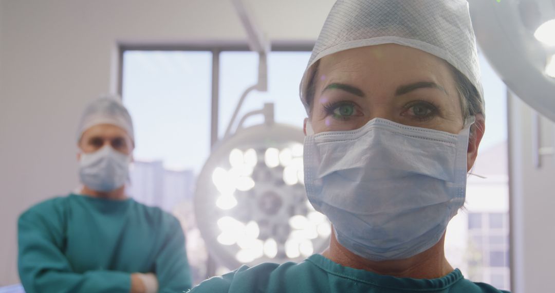 Close-up of Confident Female Surgeon with Colleague in Operating Room - Free Images, Stock Photos and Pictures on Pikwizard.com