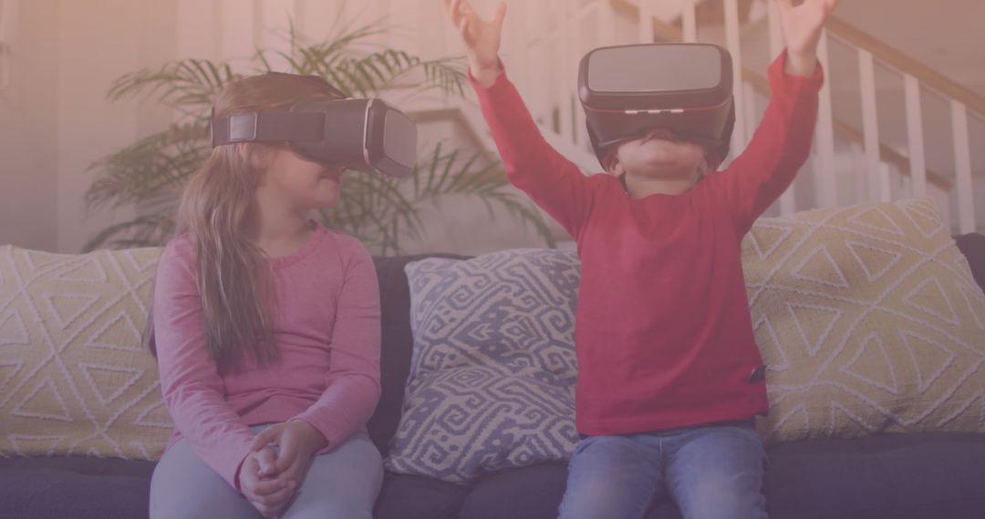 Caucasian Siblings Experiencing Virtual Reality in Family Room