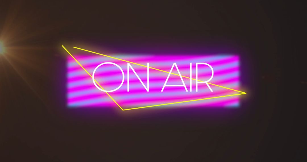 Neon 'ON AIR' Sign Illuminating Dark Studio with Retro Vibe