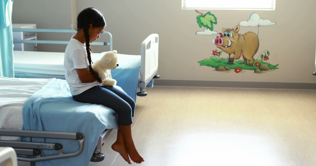 Lonely Child Holding Teddy Bear in Pediatric Hospital Room - Free Images, Stock Photos and Pictures on Pikwizard.com