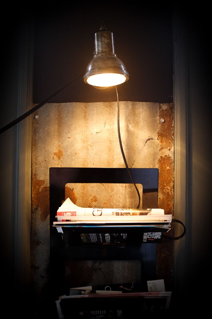 Cozy Reading Nook with Industrial Lamp and Books - Free Images, Stock Photos and Pictures on Pikwizard.com