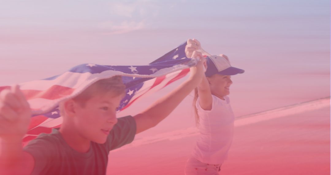 Children Running on Beach Holding American Flag