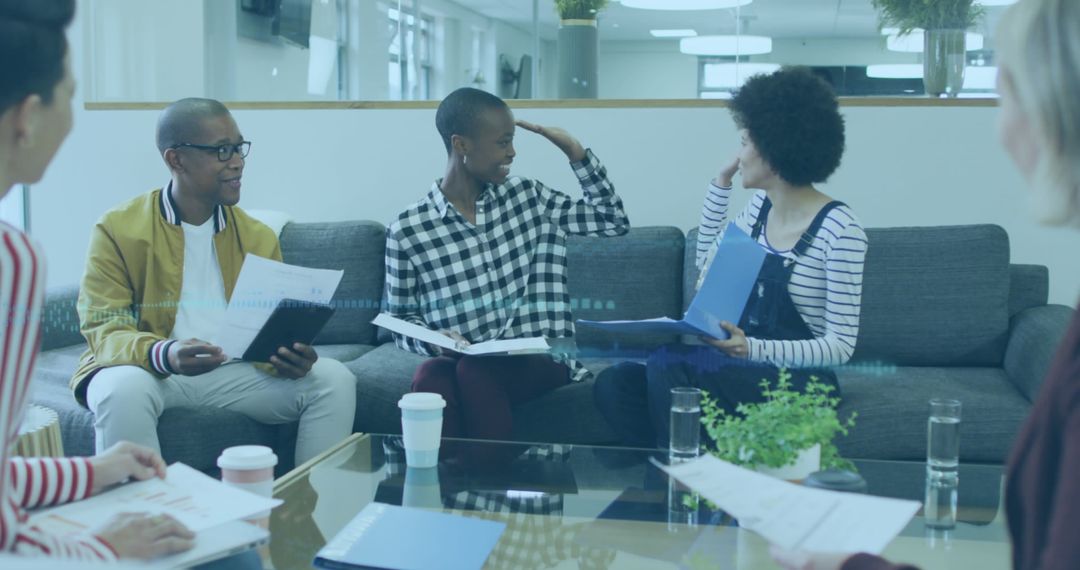 Diverse Business Team Collaborating with Digital Interface Elements