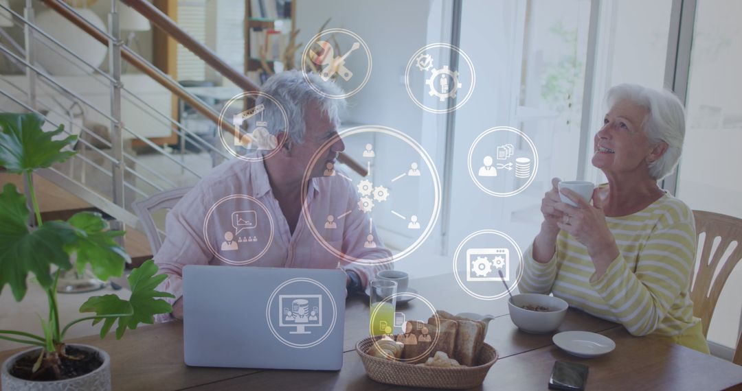 Senior Couple Using Laptop with Digital Network Overlay