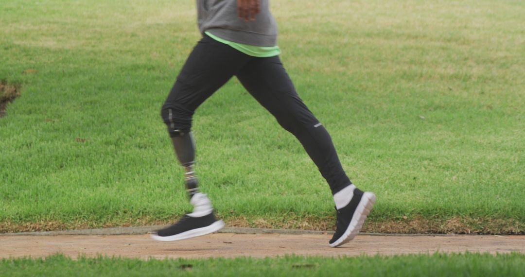 Person with Prosthetic Leg Jogging in Park - Free Images, Stock Photos and Pictures on Pikwizard.com