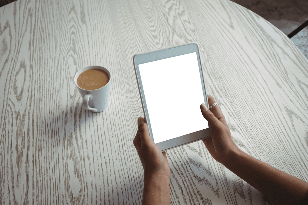 Transparent Tablet in A Modern Coffee Setting With Latte