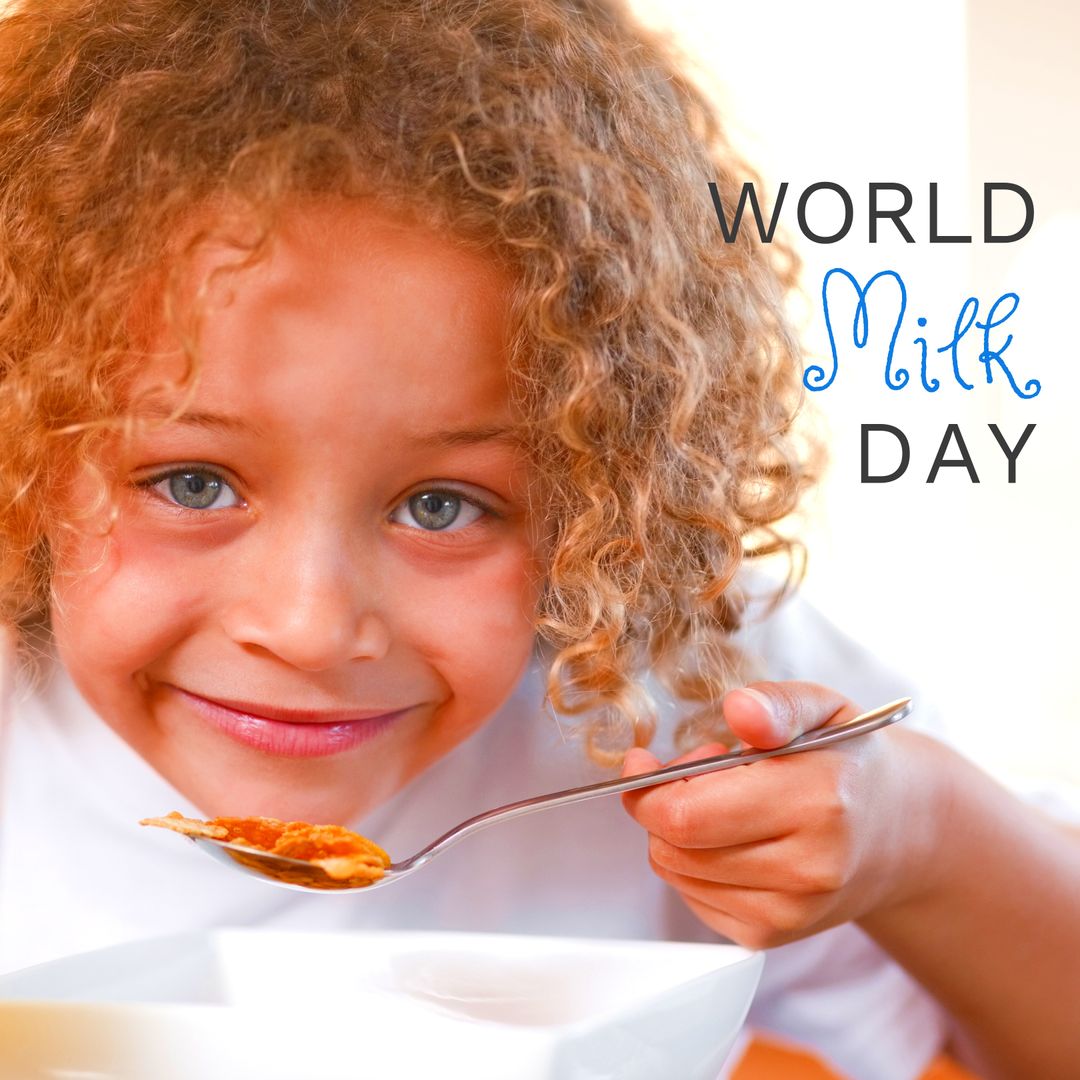 Smiling Child Enjoying Breakfast for World Milk Day Event