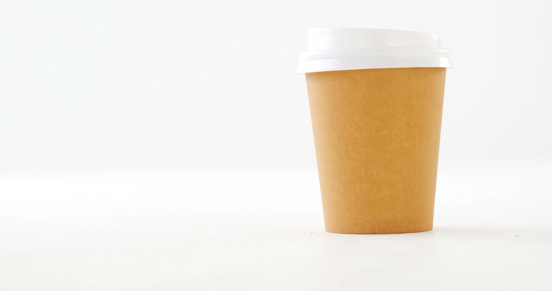 Eco-Friendly Disposable Coffee Cup with White Lid on White Background - Free Images, Stock Photos and Pictures on Pikwizard.com