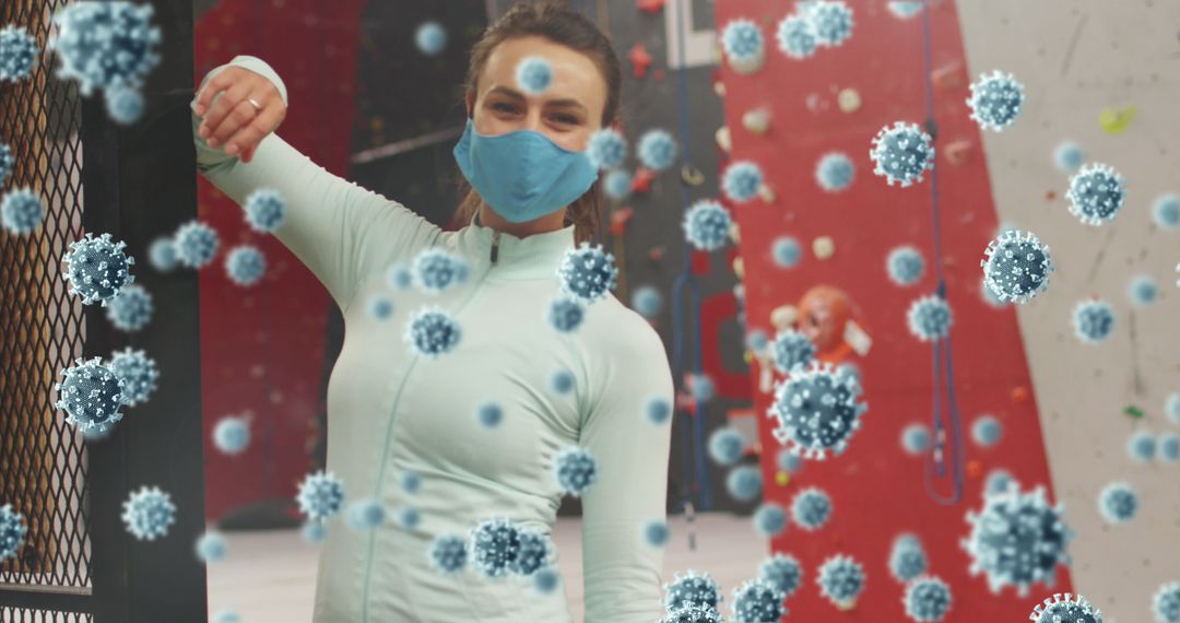 Masked Woman Climbing Gym with Virus Overlay