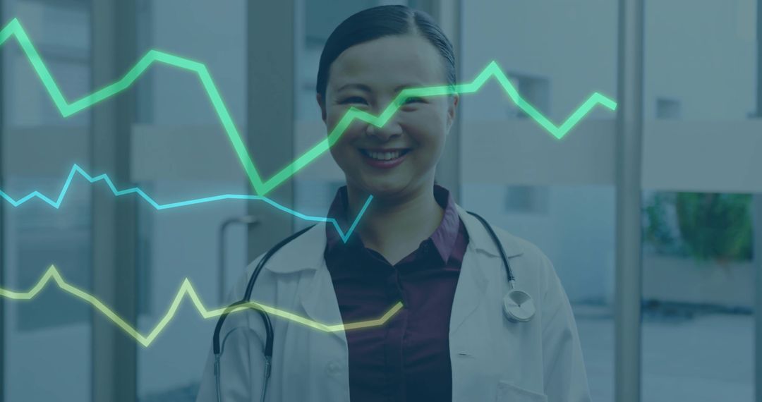 Confident Doctor Smiling in Clinic with Data Visualization