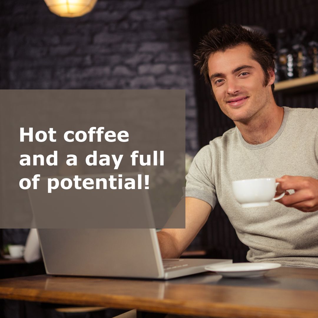 Man with Coffee Working on Laptop in Cafe Setting