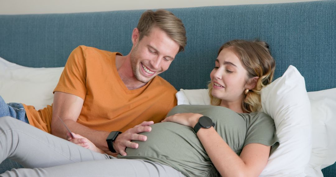 Expectant Couple Enjoying Intimate Moments at Home