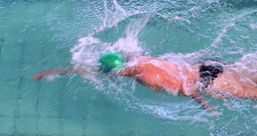 Professional Swimmer Performing Freestyle Technique - Free Images, Stock Photos and Pictures on Pikwizard.com