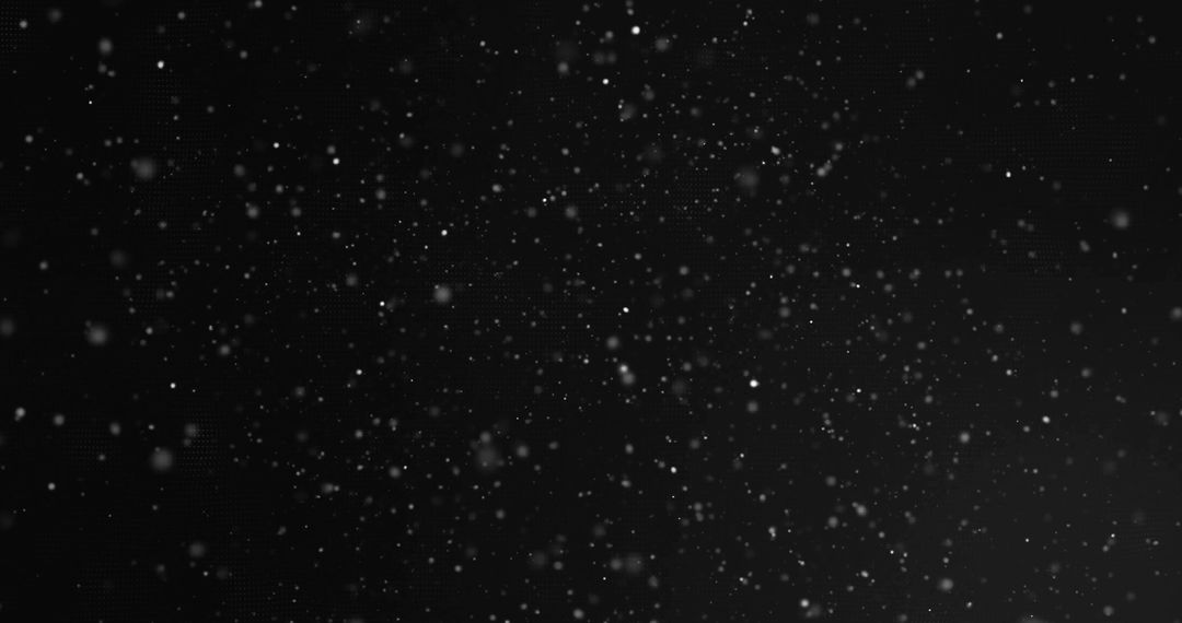 Glowing Snowflakes and Particles Creating Elegant Atmosphere