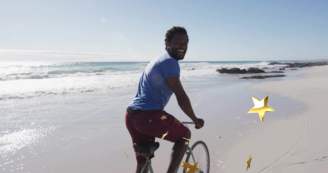 Man Enjoying Coastal Bicycle Ride on Sunny Beach