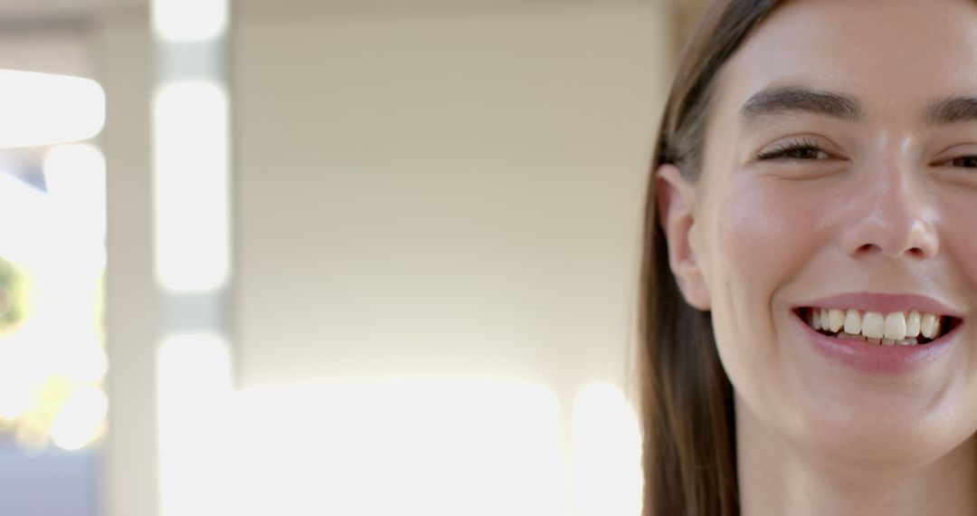 Half Shot of Smiling Girl with Joyful Expression and Bright Light