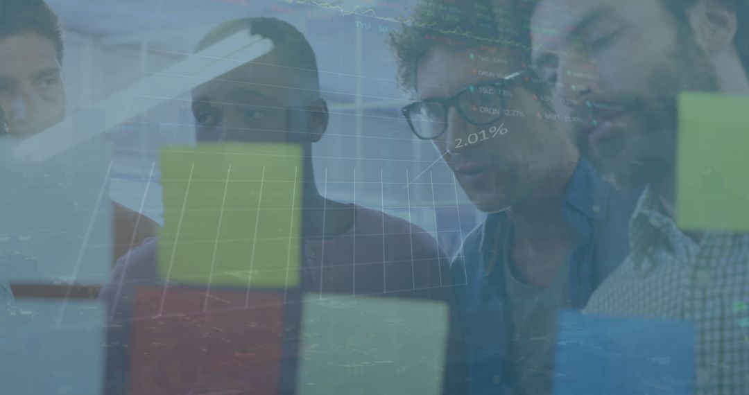 Diverse Business Team Analyzing Data with Digital Interface Collaboration