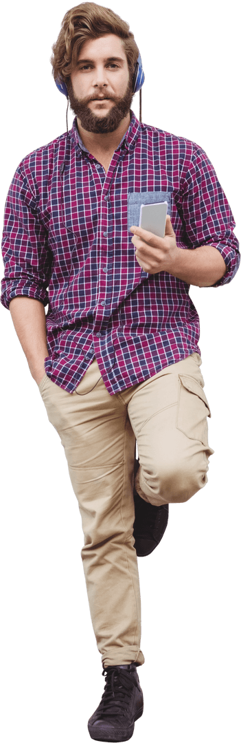 Bearded Man Relaxing with Smartphone and Headphones on Transparent Background