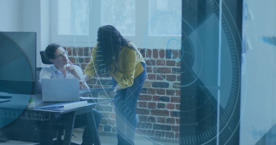 Diverse Professionals Analyzing Financial Data in Modern Workspace