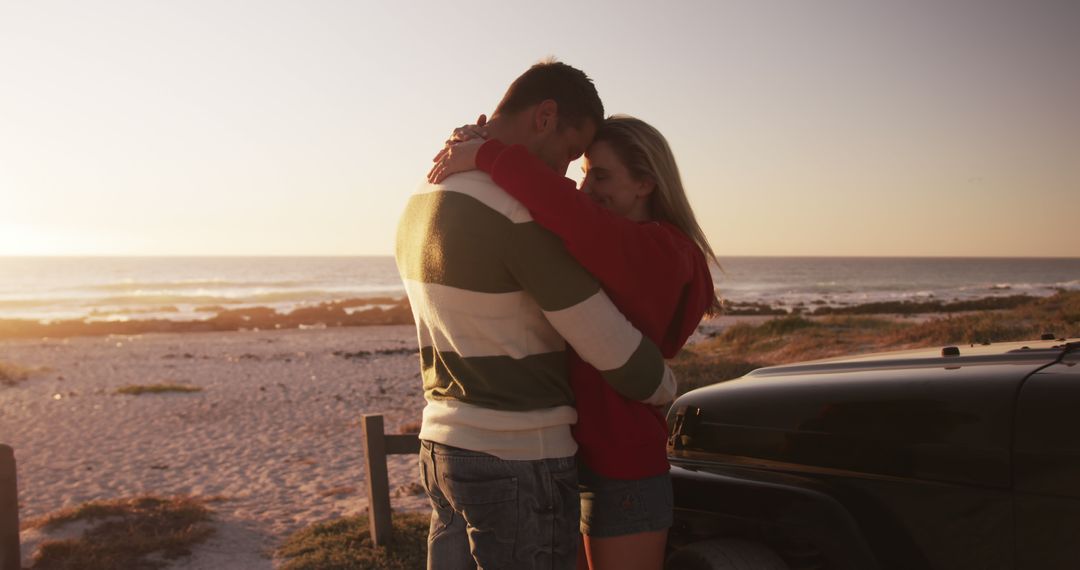 Romantic Couple Hugging On The Beach During Sunset - Free Images, Stock Photos and Pictures on Pikwizard.com