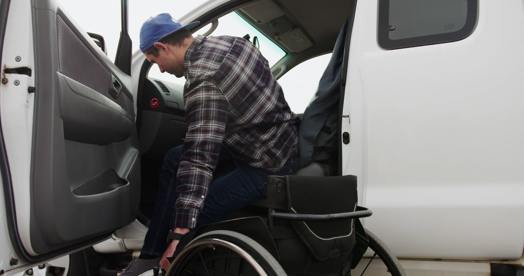 Man in wheelchair entering vehicle independently - Free Images, Stock Photos and Pictures on Pikwizard.com