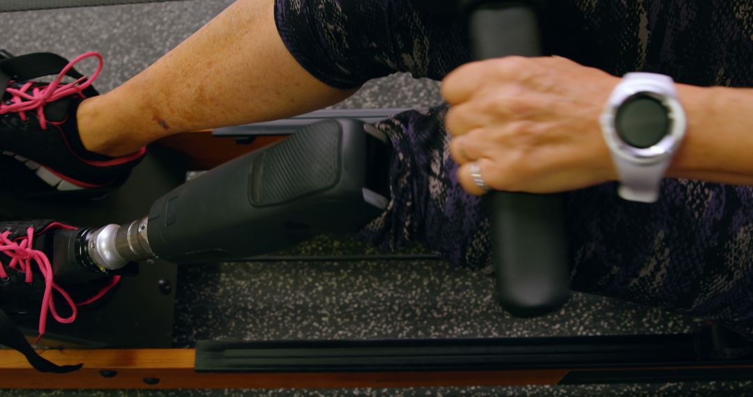 Disabled Woman Exercising on Rowing Machine in Gym - Free Images, Stock Photos and Pictures on Pikwizard.com