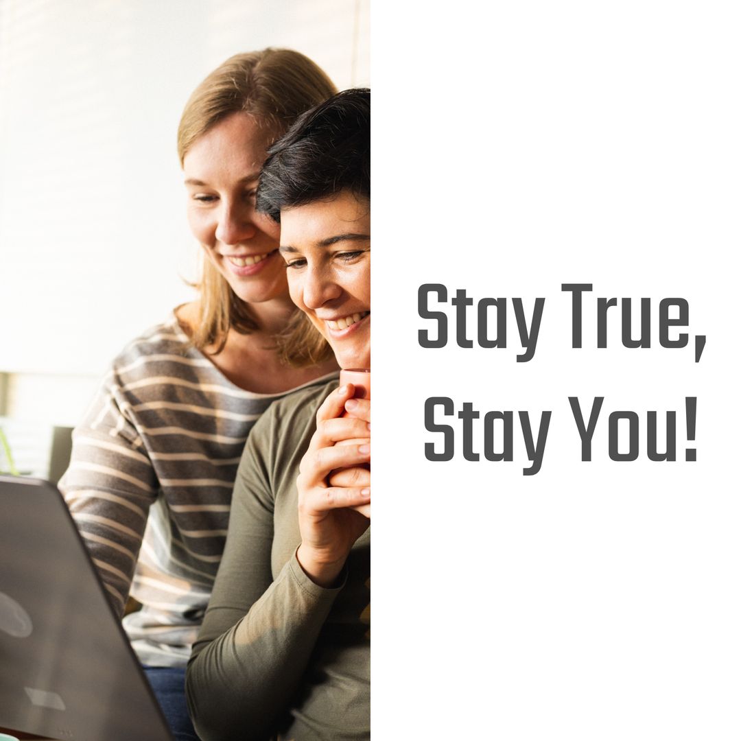 Happy Same-Sex Couple Using Laptop Together at Home