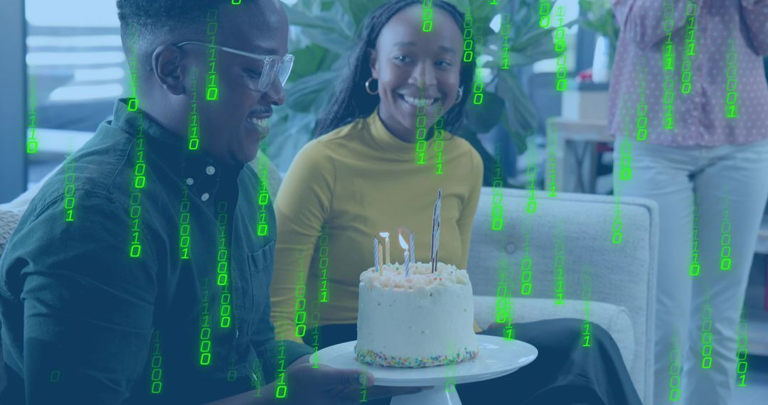 Coworkers celebrating birthday with cake and green binary code overlay for tech teams