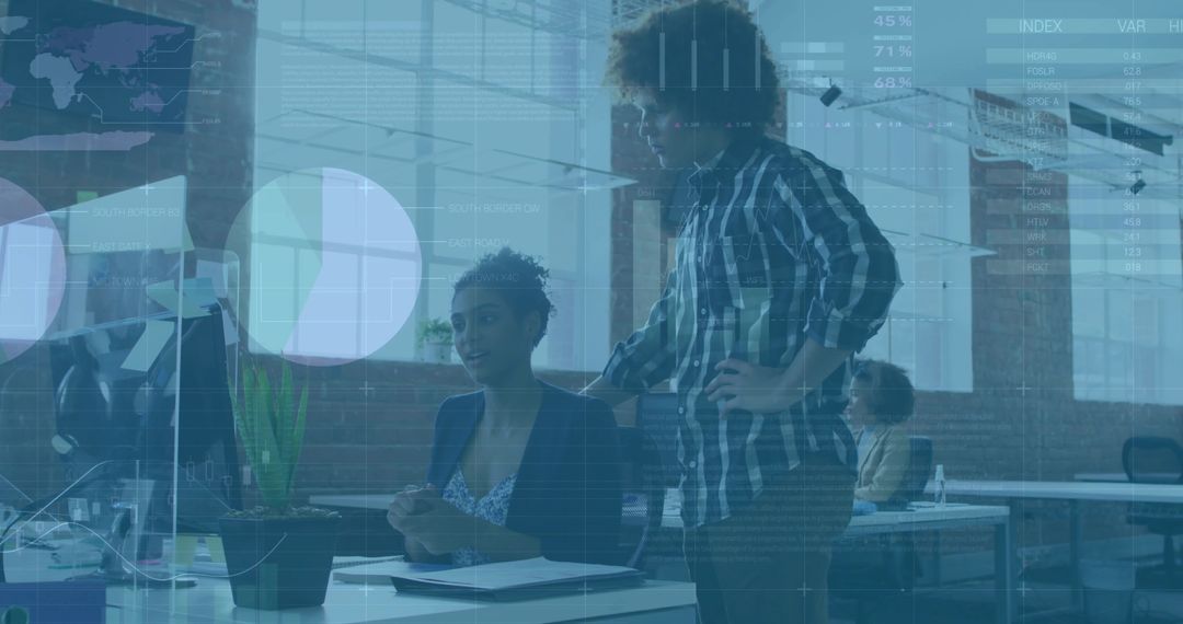 Corporate Officers Analyzing Data on Office Computer