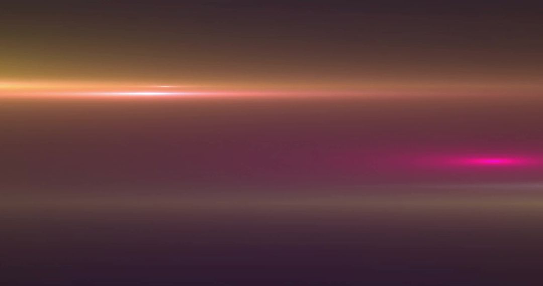 Dynamic Colored Light Trails Against Dark Background