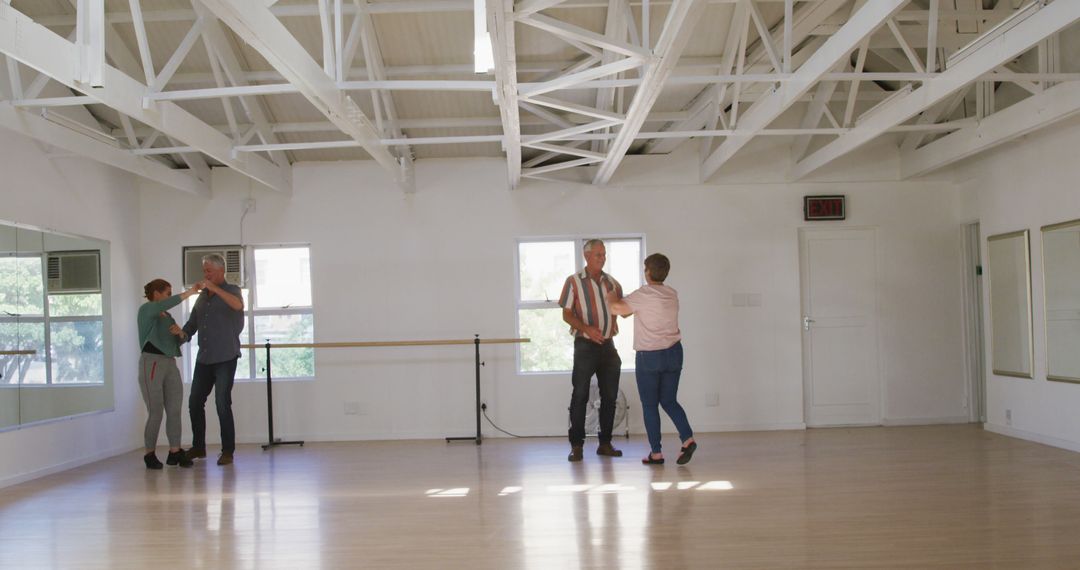 Senior Couples Enjoying Togetherness in Dance Class