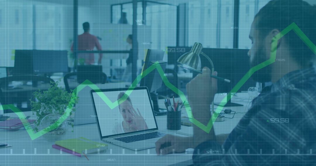 Bearded Professional Collaborating Remotely with Data Analytics Overlay in Open Office