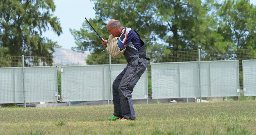 Caucasian man practices archery outdoors, with copy space - Free Images, Stock Photos and Pictures on Pikwizard.com