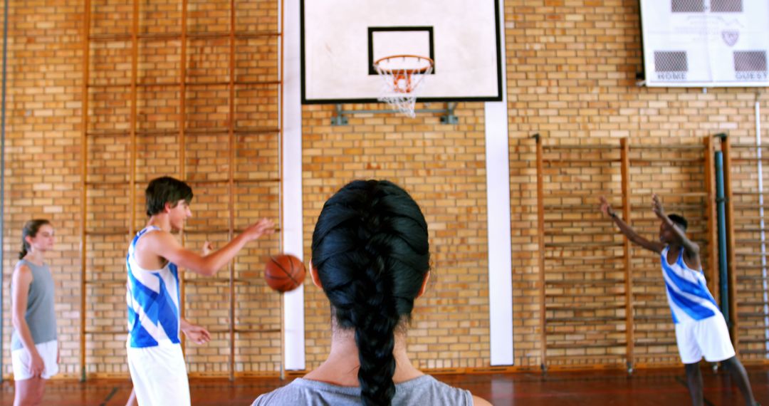 Diverse Basketball Team Practicing in Indoor Gymnasium - Free Images, Stock Photos and Pictures on Pikwizard.com