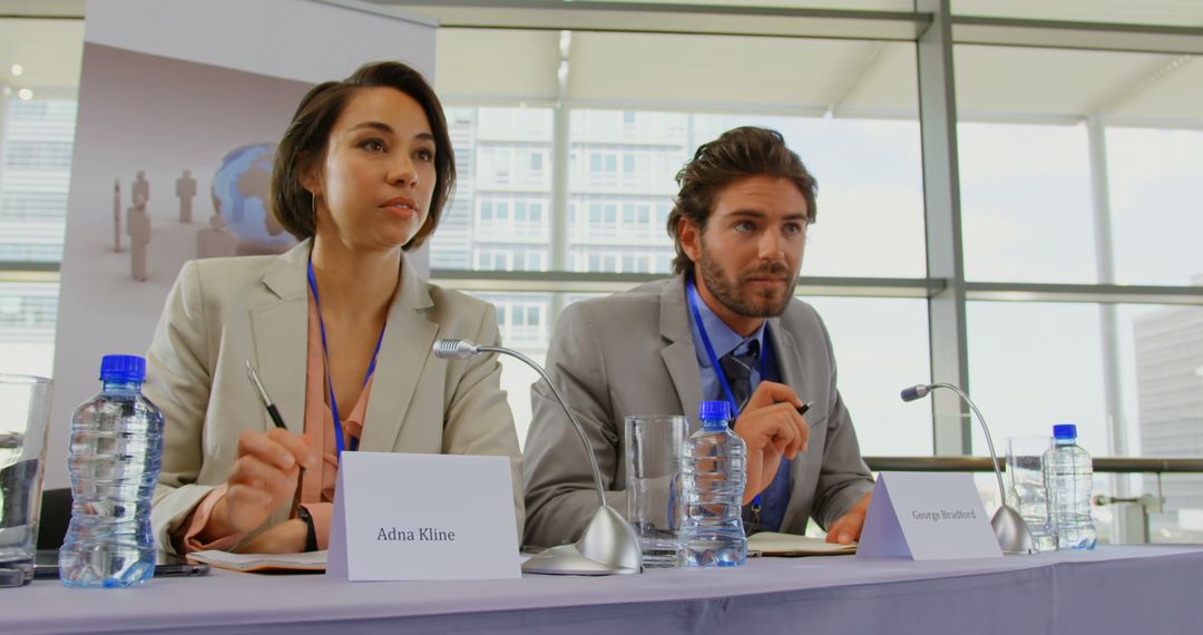 Business Professionals Attentively Engaging in Seminar Discussion