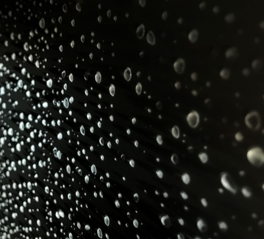 Close-Up View of Multiple Water Droplets on Black Background - Free Images, Stock Photos and Pictures on Pikwizard.com
