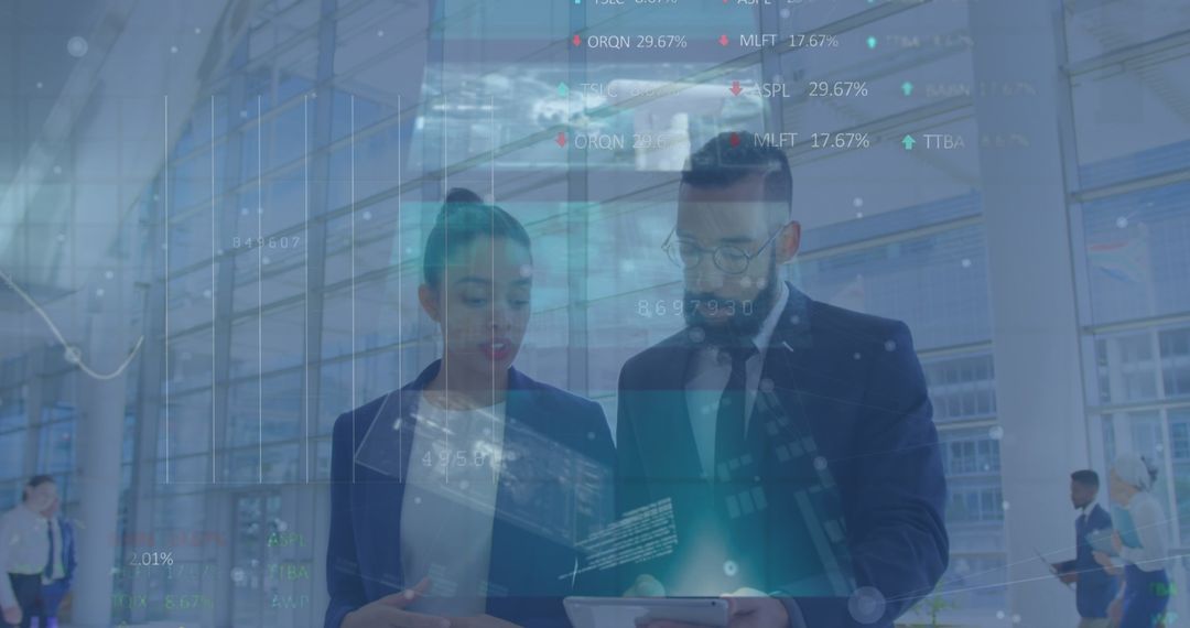 Business Colleagues Analyzing Digital Data Projections