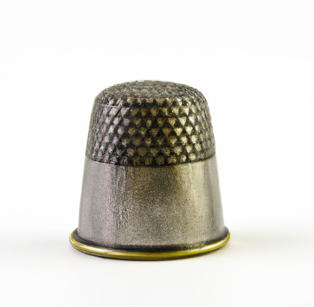 Antique Metal Thimble Isolated on White Background - Free Images, Stock Photos and Pictures on Pikwizard.com