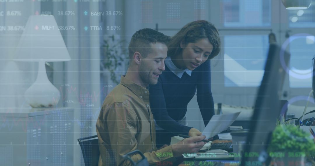 Business Colleagues Analyzing Stock Market Data in Modern Office